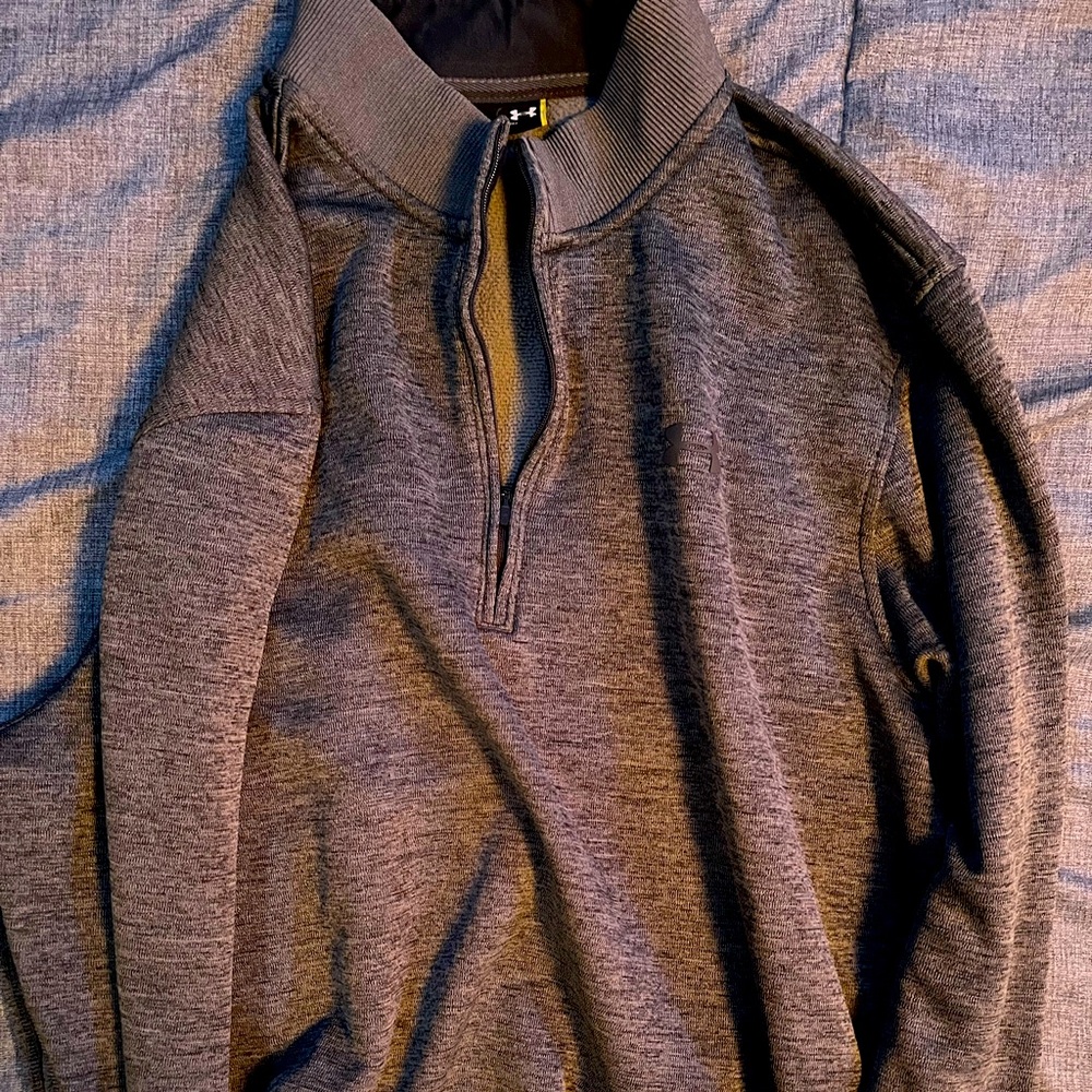Men’s XL Under Armour Quarter Zip Sweater.. it would fit better for someone Lg